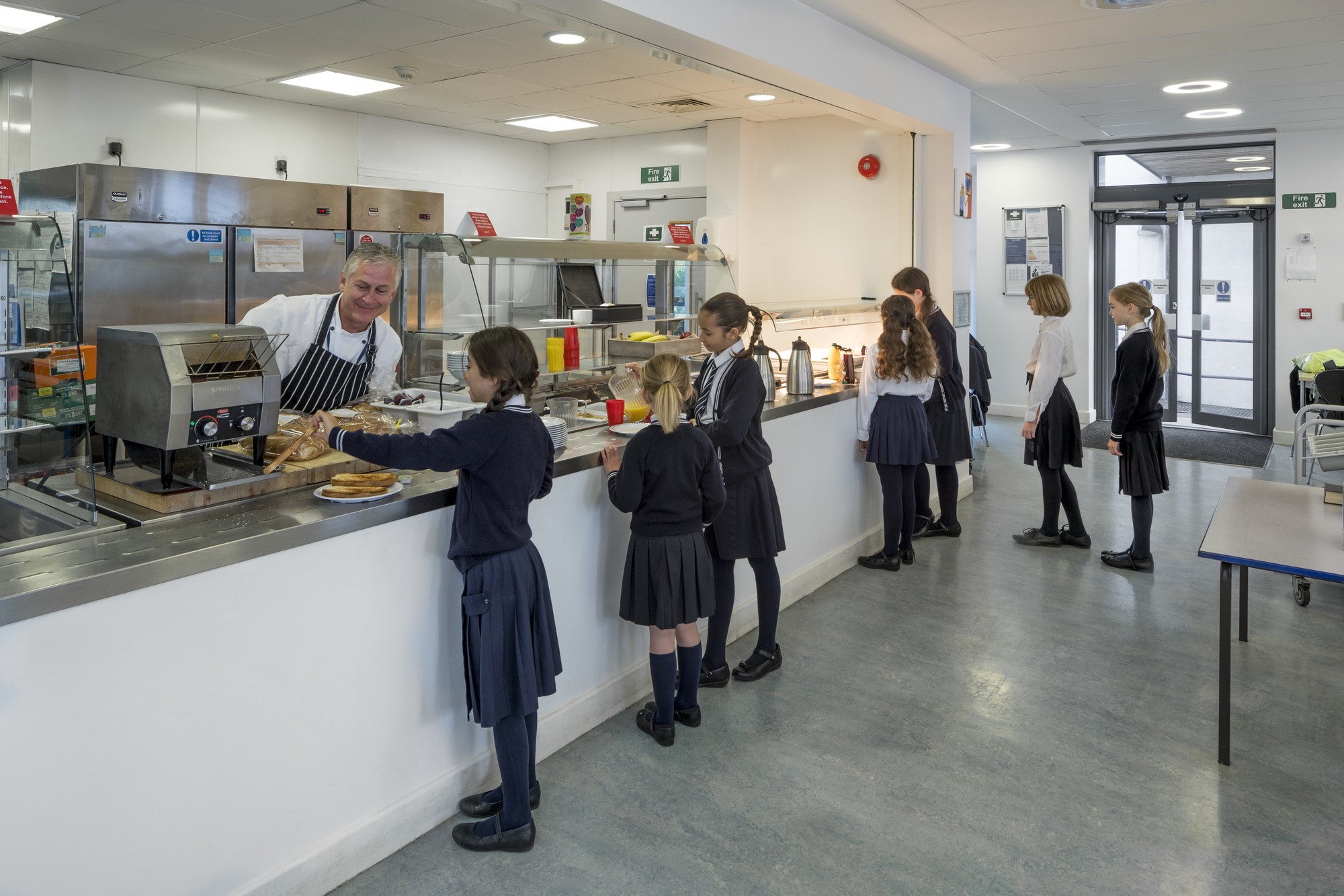 students getting their lunch from the canteen