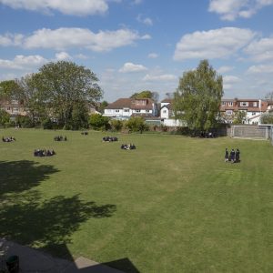 Pupils On The Back Field Aerial View